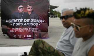 From Miami and Havana, singers take aim in battle of song