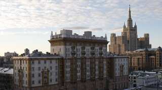US embassy says it is forced to reduce consular services in Moscow