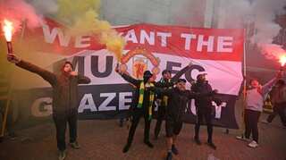 Man Utd fans' anti-Glazer protest forces postponement of Liverpool clash