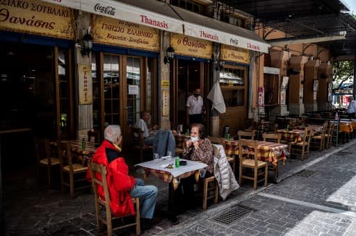 Greece reopens restaurant terraces amid joy after long Covid lockdown