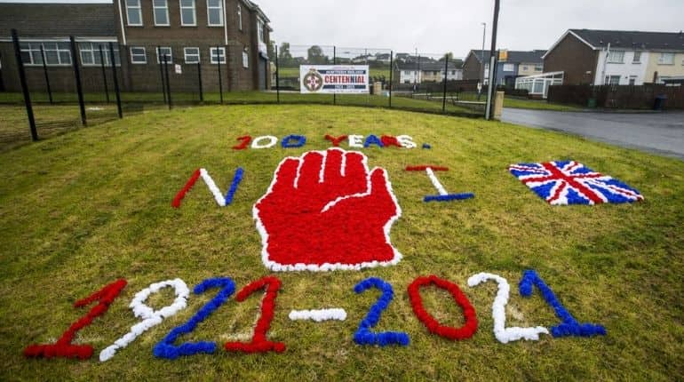 Northern Ireland marks centenary as crises simmer