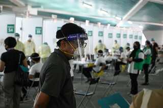 Woman dies due to COVID-19 in Singapore as new cases emerge