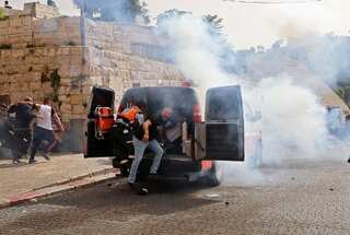 Jerusalem violence: Israel launches air strikes against Hamas in Gaza Strip