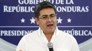 In diplomatic shift, Honduran president says he may open China office 