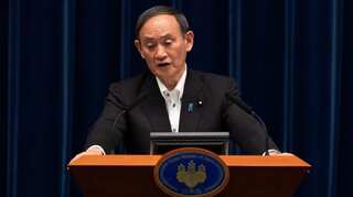 Japan PM Suga urges travel curbs as COVID-19 cases surge before Paralympics