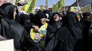 Lebanon mourns Hezbollah protester killed by Israeli fire