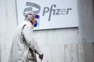 Pfizer says COVID-19 pandemic could extend to 2024