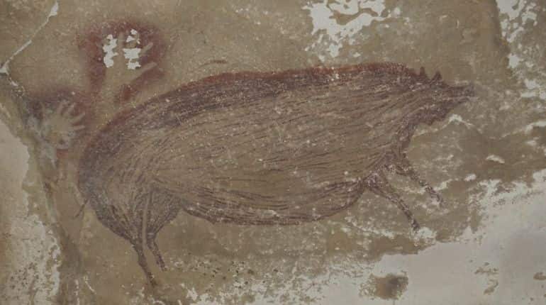 Climate change is killing world's oldest animal cave painting in Sulawesi Climate change is killing world's oldest animal cave painting in Sulawesi