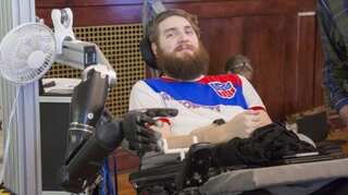 Scientists develop pioneering mind-controlled arm that restores sense of touch