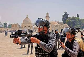 After ceasefire, Palestinians, Israeli police clash outside Jerusalem's Al-Aqsa mosque