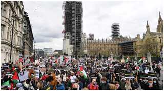 Thousands march in Britain to show support for Palestine