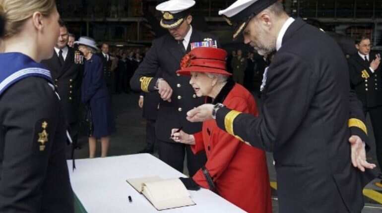UK's Queen Elizabeth visits new aircraft carrier before Asia voyage UK's Queen Elizabeth visits new aircraft carrier before Asia voyage