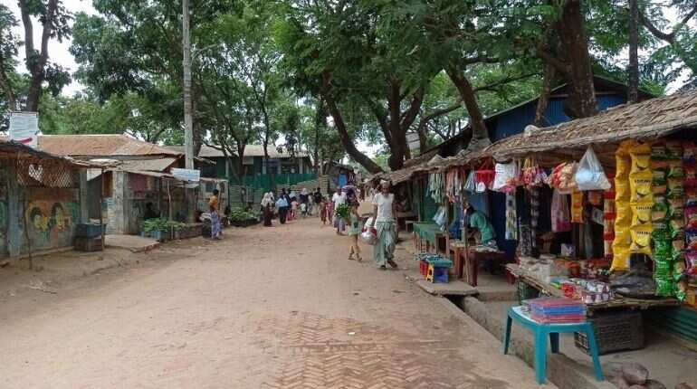 Bangladesh locks down Rohingya camps after virus spike