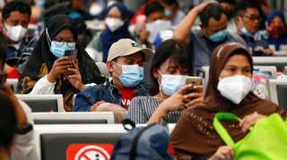 Indonesia rolls out tougher curbs as virus cases skyrocket
