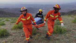 China probes deaths of 21 runners after freak weather hits ultramarathon