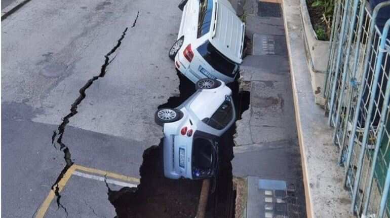 Italy: Giant sinkhole in Rome swallows two parked cars