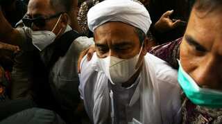Indonesia jails firebrand cleric for breaking virus rules