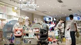 China's new three-child policy boosts shares in toy, diaper makers