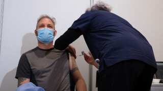 US federal court temporarily halts President Biden's vaccine mandate   