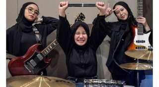 Indonesia's hijab headbangers trade village life for metal heaven