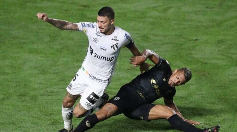 Football: Marinho misses penalty but scores to help Santos to 3-1 win Football: Marinho misses penalty but scores to help Santos to 3-1 win