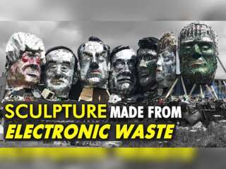 Artists create giant e-waste 'Mount Recyclemore' sculpture of G7 leaders