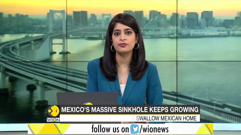 Huge sinkhole in Mexico threatens to swallow house