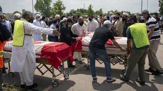 Muslim victims of truck attack given farewell with coffins draped in Canadian flags