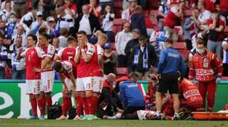 Football: Denmark's Eriksen rushed to hospital after collapsing in Euro 2020 match