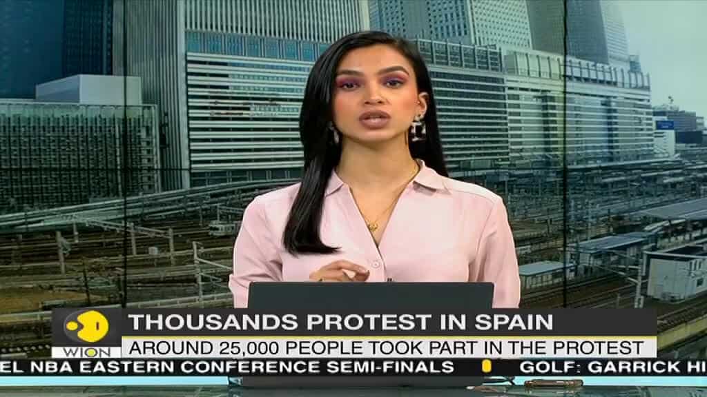 Thousands in Spain protest plans to pardon Catalan separatist leaders