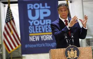 Once virus epicenter, New York lifts Covid curbs after vaccination success