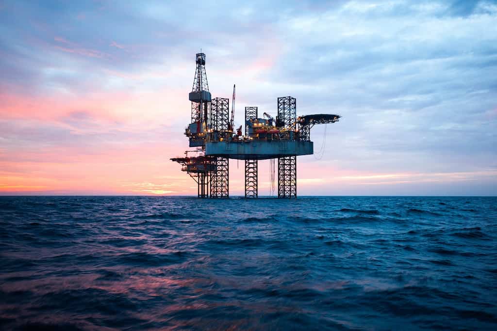 Oil slips again on surging US dollar