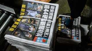 'We must press on': Two Apple Daily executives charged in Hong Kong under China's security law