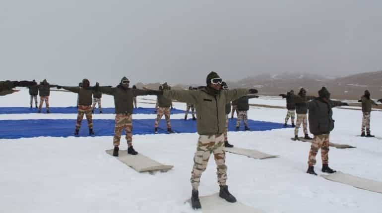 Indo-Tibetan Border Police personnel perform Yoga in icy heights of Ladakh