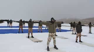 Indo-Tibetan Border Police personnel perform Yoga in icy heights of Ladakh