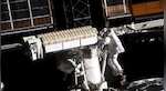 International Space Station astronauts complete six-hour spacewalk to install solar panels