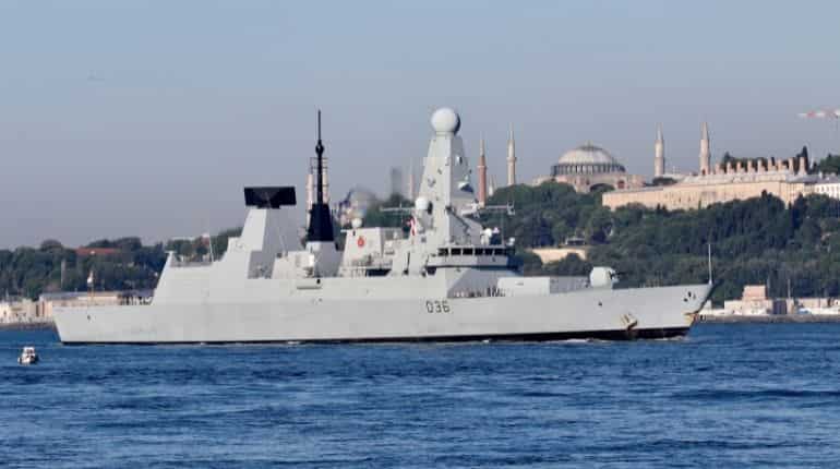 Russia fires warning shots to deter British warship near Crimea