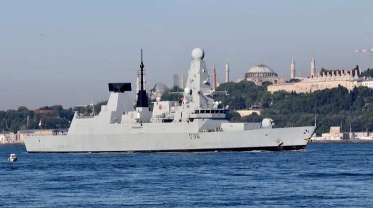Russia fires warning shots to deter British warship near Crimea