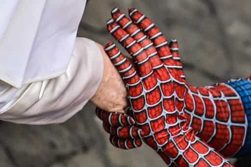 Spider man shakes hand