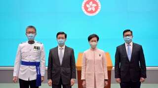 China reshuffles Hong Kong top officials