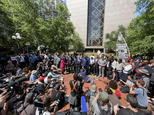 People surround Civil Rights Lawyer