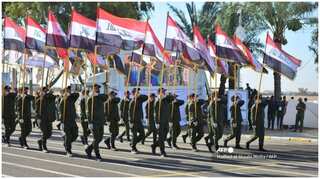 Iraqi paramilitaries, Iran-backed factions hold parade in Iraq