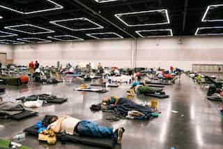 Canadians pack into cooling centres as heatwave death toll doubles