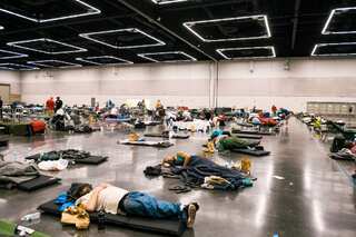 Canadians pack into cooling centres as heatwave death toll doubles