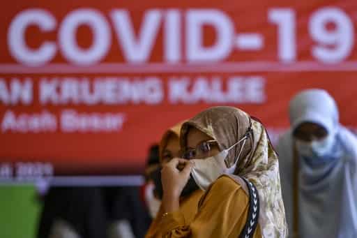 Indonesia imposes emergency restrictions amid virus surge Indonesia imposes emergency restrictions amid virus surge