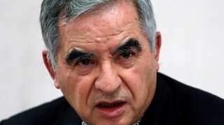 Vatican judge indicts 10, including a cardinal, for alleged financial crimes