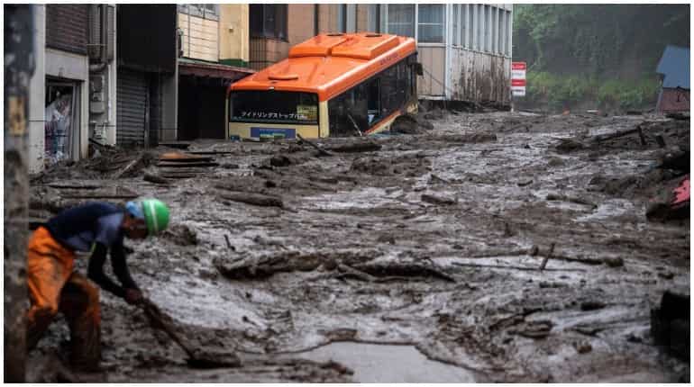 Japanese city battles with landslides after heavy rains
