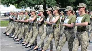 Watch: Ukraine's female soldiers made to march in heels