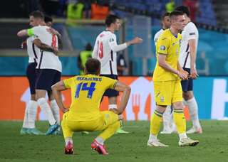 Football-Last eight Euros exit flatters modest Ukraine