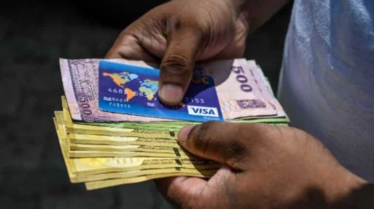 To combat a growing cash crunch, Sri Lanka tightens foreign currency outflows